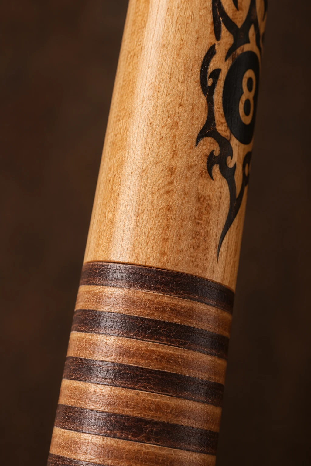 Illustrated close-up of Outlaw OL29 maple and two-tone stacked leather