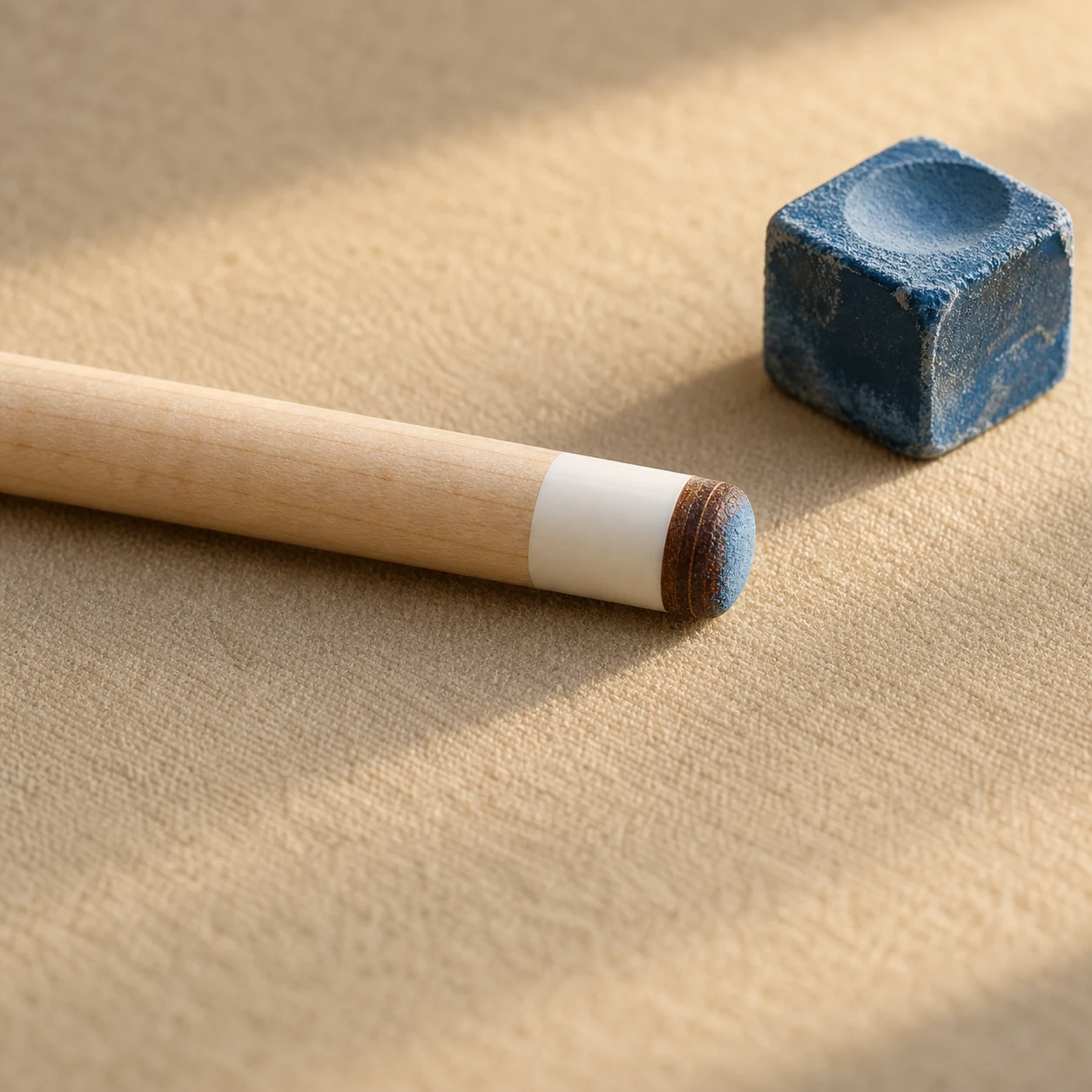 Illustrative layered pool cue tip and chalk for Outlaw cue buying notes